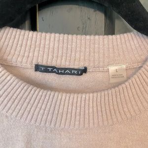 Pink sweater, size L. Worn once. White polka dots.